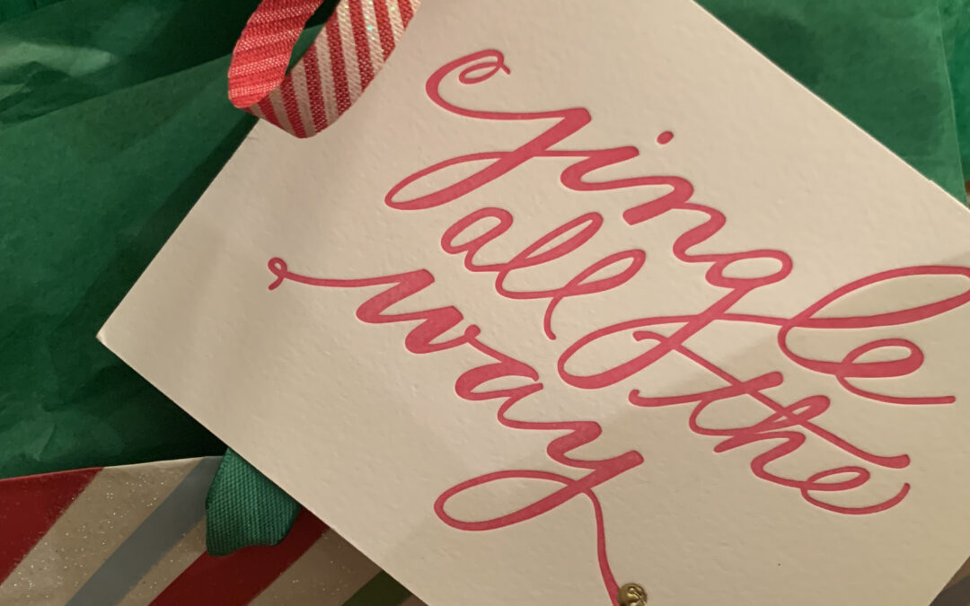 Need a fresh giftwrap idea?  Repurpose your holiday cards into gift tags.